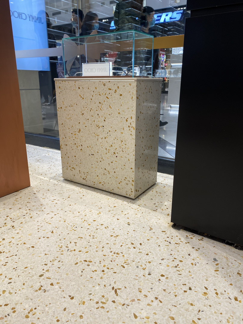 light terrazzo eyewear display and flooring