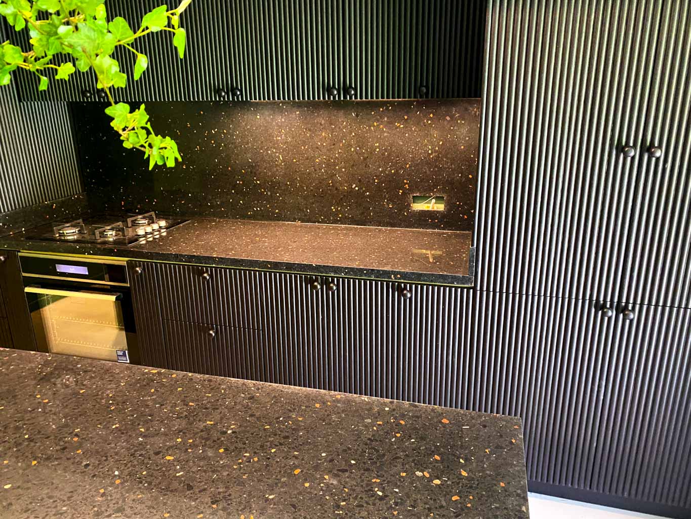 black terrazzo countertop