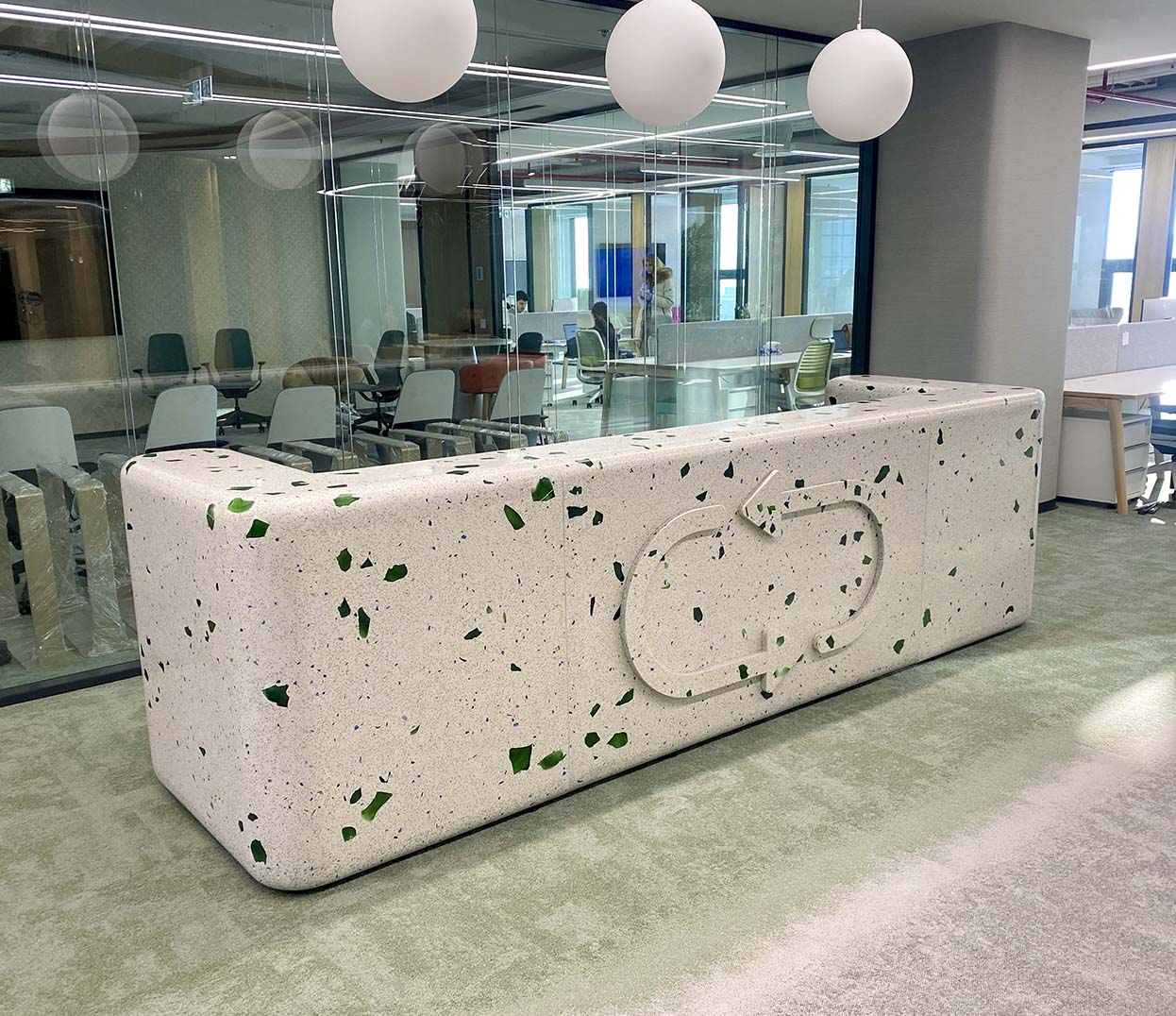 large recycling green glass reception desk